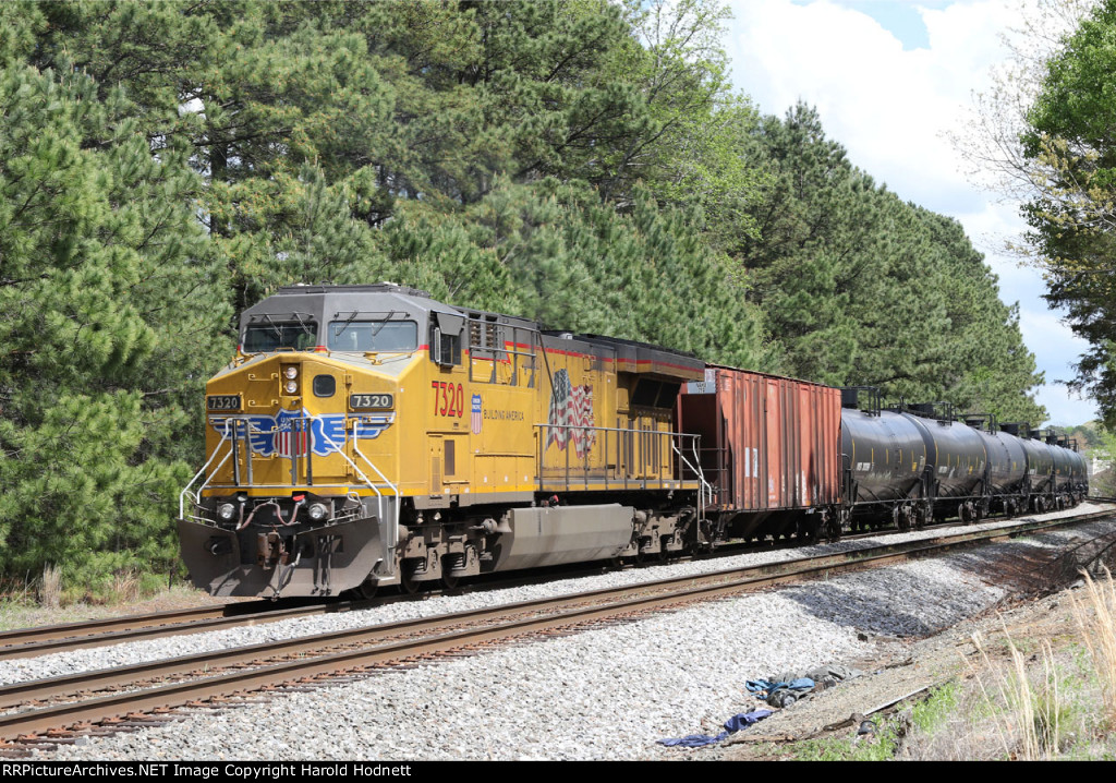 UP 7320 pushing on rear of NS train 6K4